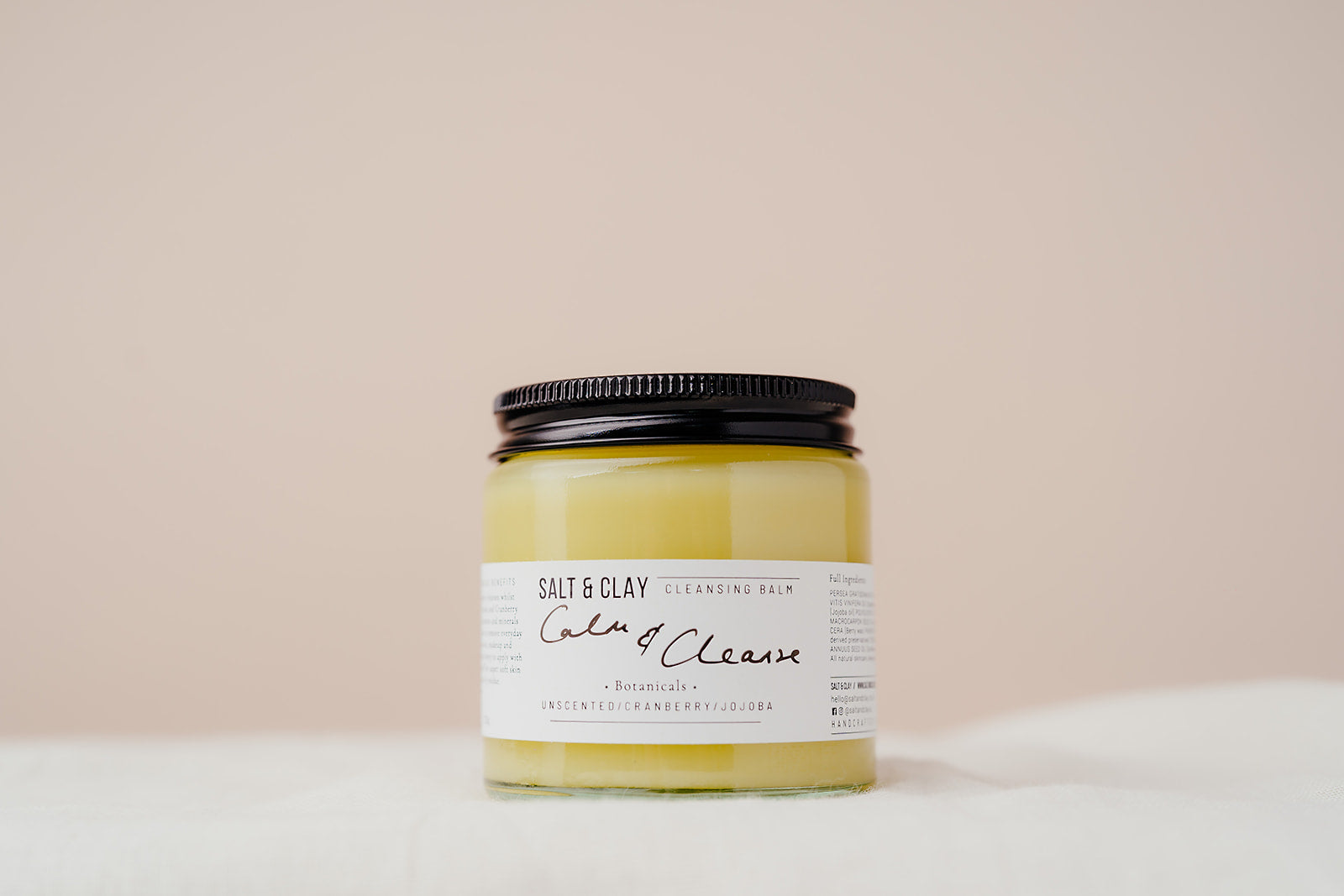 Our best selling Calm and Cleanse cleansing balm featuring nourishing and soothing butters and oils. Unscented. Plant based beauty. Vegan skincare. Vegan beauty. Salt & Clay.