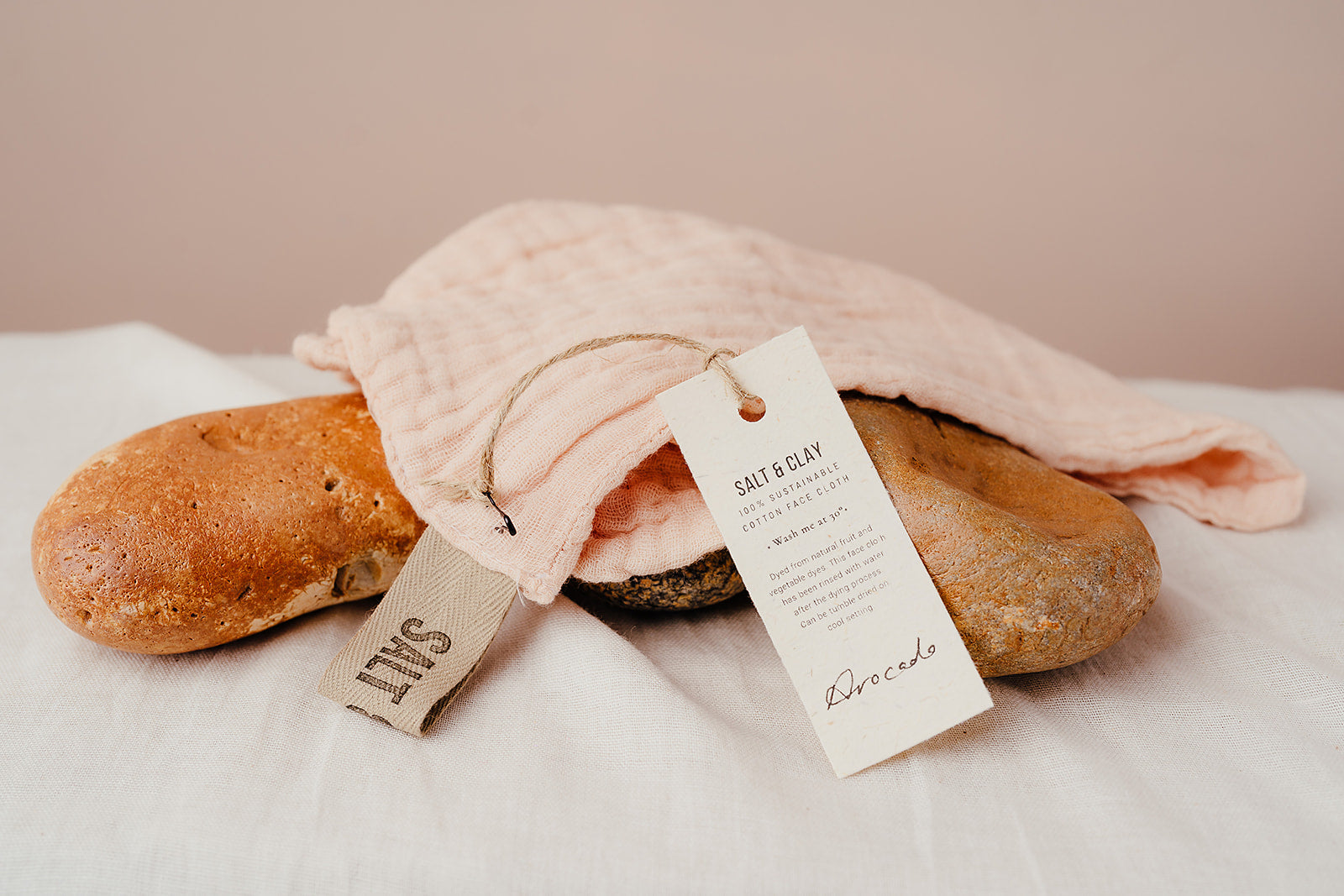 Avocado dyed face cloth. Muslin face cloth. Hand dyed with natural fruit and vegetable dyes. Vegan skincare. Salt & Clay. Hampshire UK.