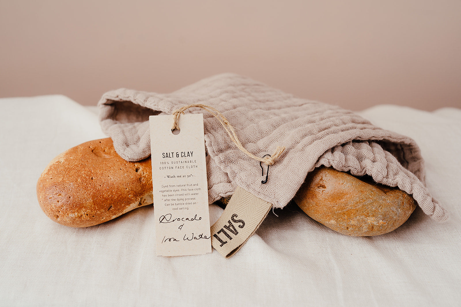 Muslin face cloth dyes with Avocado and Iron water.Face cloth. Hand dyed with natural fruit and vegetable dyes. Vegan skincare. Salt & Clay. Hampshire UK.