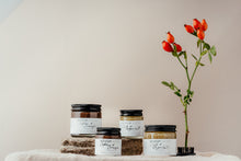 Load image into Gallery viewer, Coffee and orange face scrub made by Salt &amp; Clay. Packaged in a recycled glass jar with a recyclable aluminium lid. Vegan friendly skincare.  
