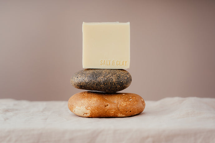 A luxury pale creamy yellow soap made by Salt and Clay. It is hand stamped with our logo Salt & Clay. Packaged in recycled paper packaging and hand sewn. All of our soaps are Vegan friendly and cruelty free. Made in small batched in Hampshire, England.  